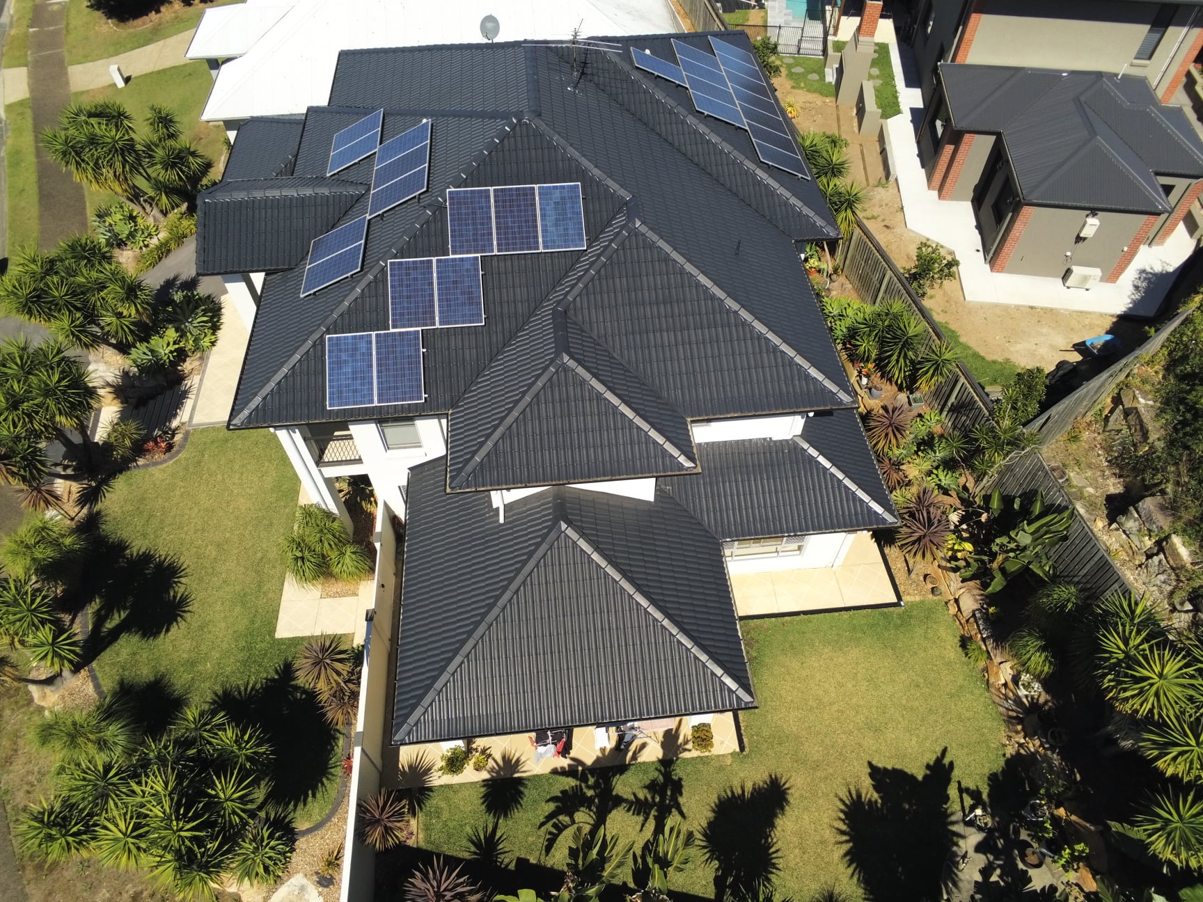 Charcoal roof restoration with solar panels